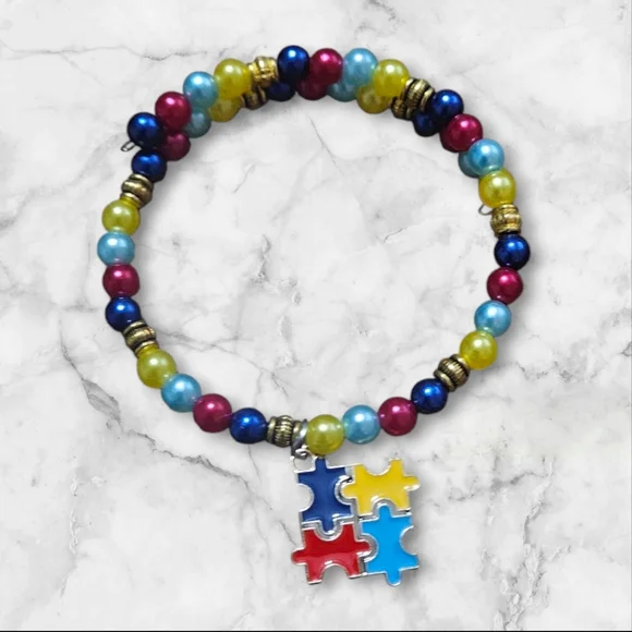 NWOT Autistic Puzzle Piece Bracelet - Picture 3 of 4